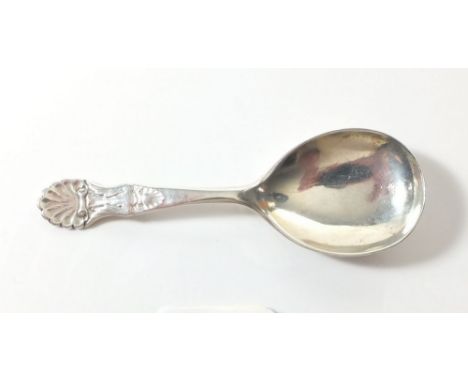 A silver caddy spoon with shell handle, Birmingham 1907 by Charles Wilks 