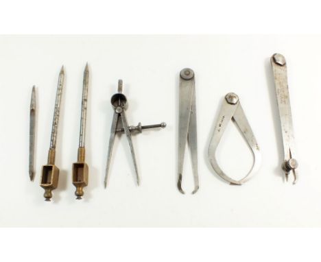 A small tray of engineers tools such as Calipers etc. 