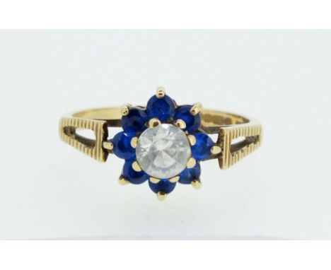 A 9ct gold dress ring set blue and white stones, 2.4g, Size M/N 