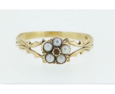 An Edwardian gold seed pearl flower form cluster ring, (unmarked), size M 