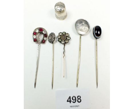 Five various antique and later stick pins including silver and banded agate examples 