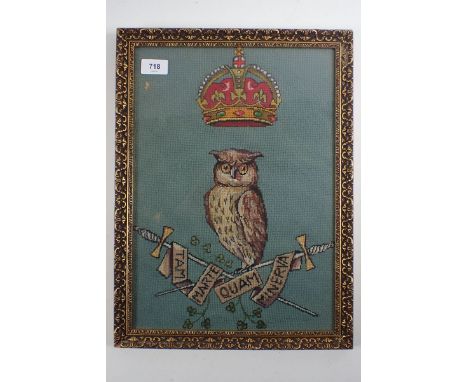 A military tapestry depicting owl and crossed swords for Defence College, India - 40 x 28cm 