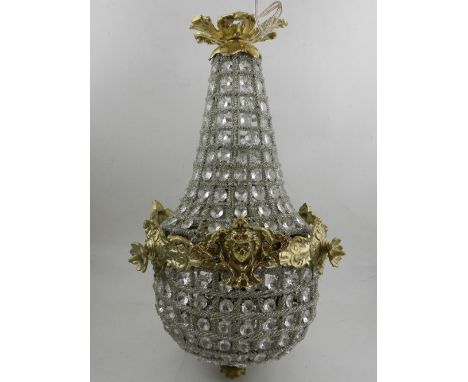 A brass mounted crystal drop ceiling lamp, with swag decoration. 