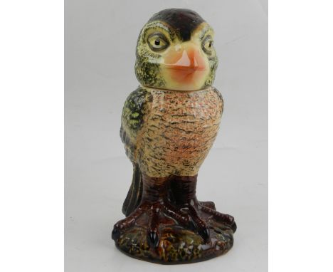 In the Martin Bros. style, a ceramic tobacco jar in the form of a grotesque bird.