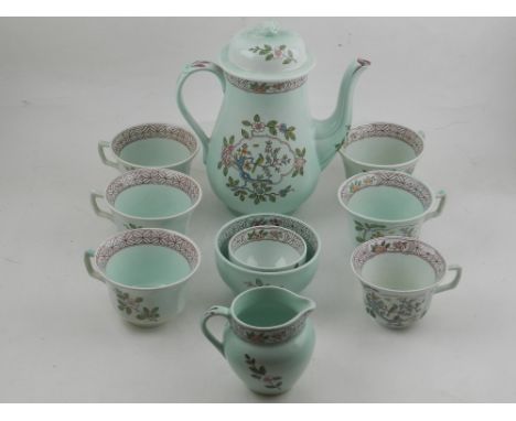 An Adams Calyx ware porcelain tea service, in the Singapore bird pattern, to include four cups, tea pot, two sugar bowls and 