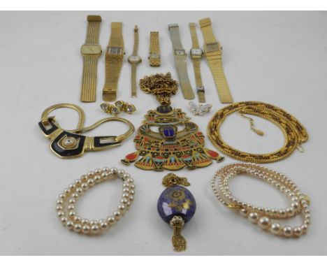 A quantity of costume jewellery, to include a large Egyptian pendant and chain, faux pearl necklaces etc. together with seven