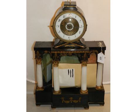 An early 20th century mantel clock, the Roman enamelled dial with engine turned interior, outer minute track and set subsidia