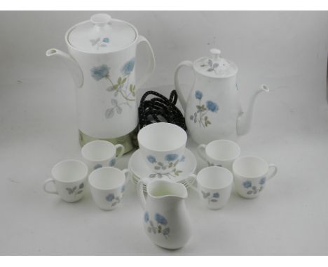 A Wedgwood pattern 'Ice Rose' porcelain coffee service, to include coffee cups, milk jug, sugar bowl, tea pot and an electric