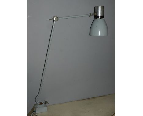 A grey painted industrial machinist lamp, adjustable, L.110cm