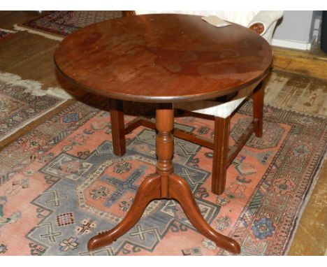 A 19th century mahogany tilt-top side table, raised on column support and tripod legs. D: 68cm H: 74cm 