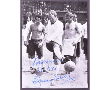 Football - Bobby Moore (1941-1993) - Escape To Victory (1981 Movie) - small black and white signed photograph of Moore in the