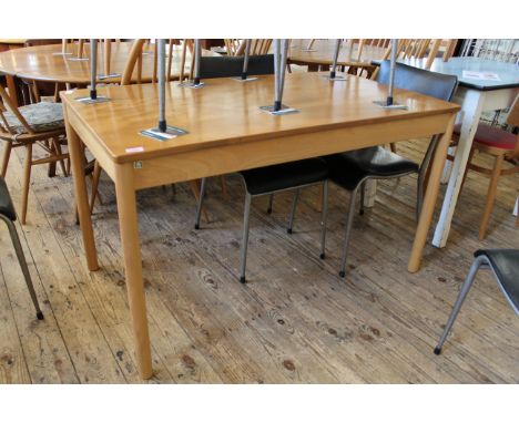 An Ercol blonde beech dining table