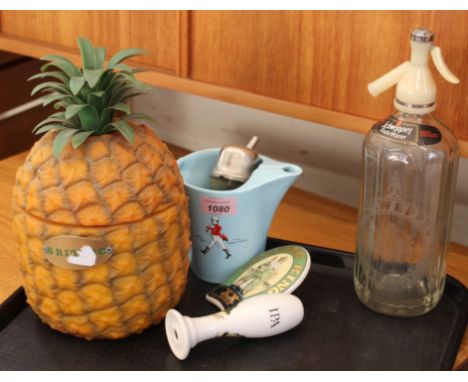 A vintage Britvic pineapple ice bucket, a Quick Serve spirit measure, Johnny Walker jug, soda syphon, ceramic beer pump etc