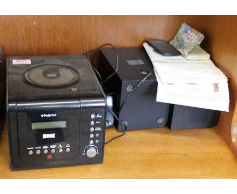 A black Polaroid CD player with speakers