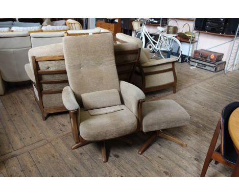 An Ercol Gina oak upholstered reclining chair with foot stool