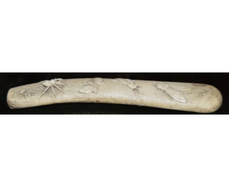 A 19th century Asian bone dagger handle with carved insect decoration. With a MOP panel makers mark. 20cm long.