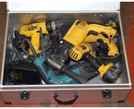A mixed lot of power tools including Makita and DeWalt examples