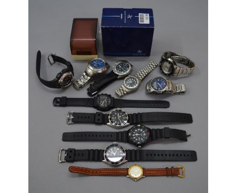 11 Casio wristwatches and two boxes.