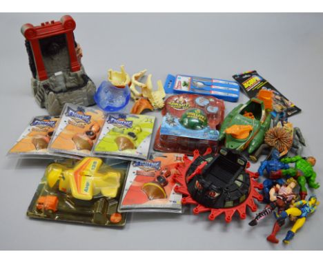 A small quantity of carded items including Fighting Tops, Gormiti Magic Egg and a Thunderbirds childs Cutlery Set together wi