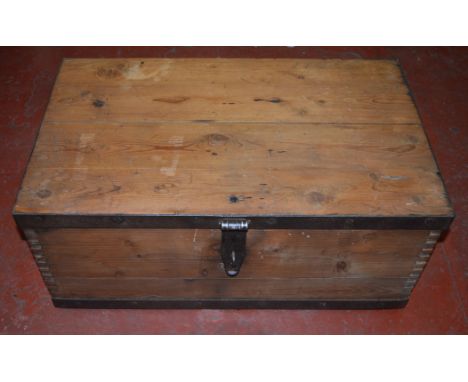 A vintage wooden trunk with metal banding. 66cm long.