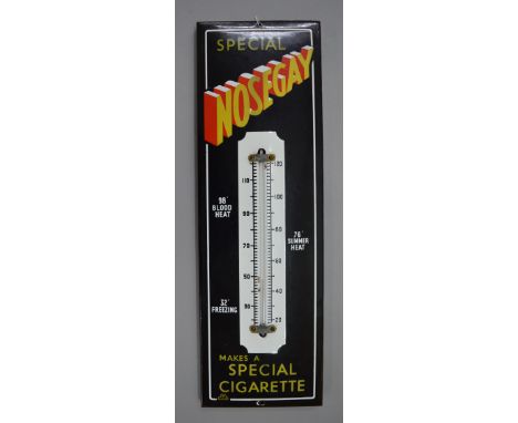 A Nosegay tobacco enamel sign in the form of a thermometer. 57cm x 19cm.