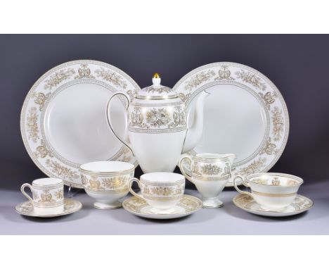 A Wedgwood Bone China "Gold Columbia" Gilt Patterned Part Tea, Coffee and Dinner Service, comprising - two tureens and covers