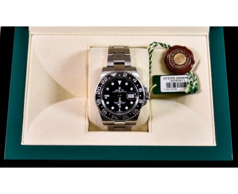 A Gentleman's Automatic Wristwatch&nbsp;by Rolex, Model GMT Master, Serial No. 3078D813, a stainless steel case, 42mm diamete