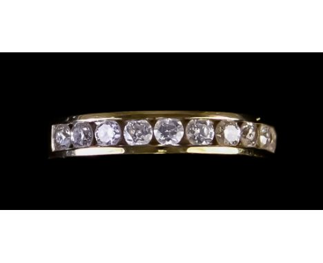 An 18ct Gold Diamond Set Half Hoop Eternity Ring, set with brilliant cut white diamonds, approximately .75ct total, size H, g