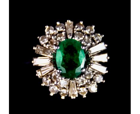An 18ct White Gold Emerald and Diamond Ring, set with a centre faceted emerald, approximately .75ct, surrounded by brilliant 