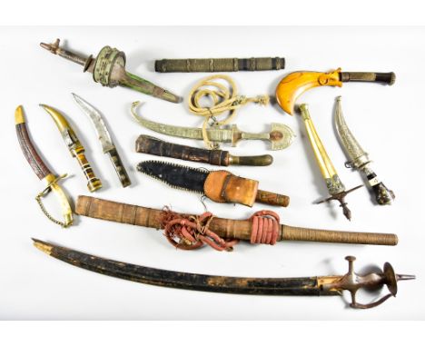 A Quantity of Historic Edged Weapons, comprising - an Indian talwar, an Asian daj, an Indian dagger in arm scabbard, a "Bowie