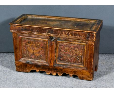 A 17th Century Continental Stained Pine Coffer of Small Proportions, with panelled top, two panel front applied and painted w