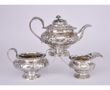 A William IV Harlequin Silver Circular Three Piece Tea Service, makers&nbsp;mark to teapot and milk jug indistinct, London 18