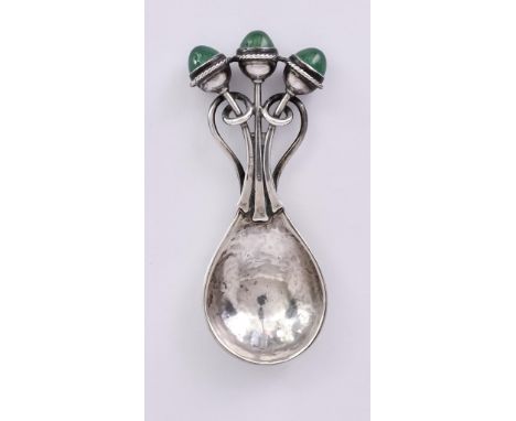 A George V Arts & Crafts Silver Caddy Spoon, by Omar Ramsden, London 1934, with planished fig-shaped bowl, the terminal with 