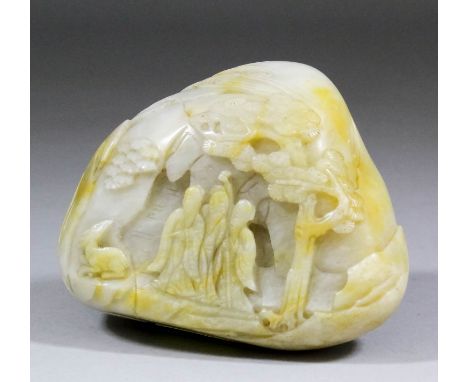 A Chinese Pale Green Jade "Three Star God" Mountain of Pebble Form, 19th Century, carved in low relief with Three Star Gods a
