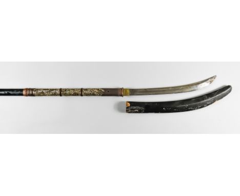 A Japanese Naginata Pole Arm, 16ins double edged curved blade, crushed shell decoration to top of shaft, lacquered saya, 84in