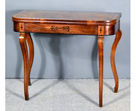 A George III Figured Mahogany Rectangular Card Table, inlaid with ebonised stringings, with rounded front corners, baize-line