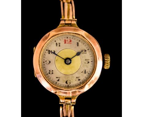 A Manual Wind Lady's Wristwatch, 9ct gold case, 30mm diameter, with silver dial and black Arabic baton numerals, on 9ct gold 