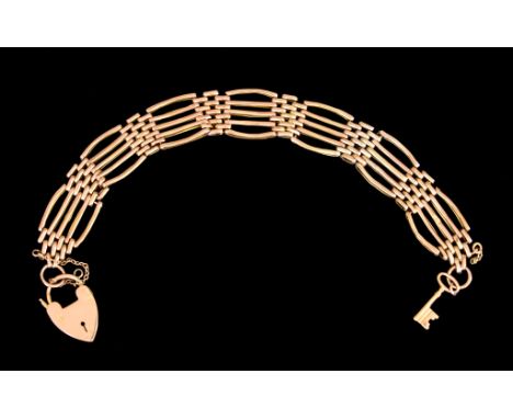 A 9ct Gold Gate Bracelet, with padlock clasp and suspended key charm, 210mm overall, gross weight 18.4g