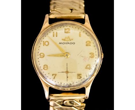 A Gentleman's&nbsp;Manual Wind&nbsp;Watch, by Movado, 9ct gold case, 32mm diameter, silver dial with gold Arabic baton numera