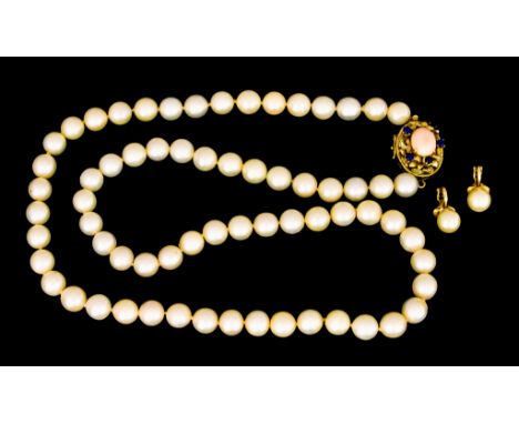 A String of Cultured Pearls,&nbsp;by Fordley, fitted with an 18ct gold clasp set with gems, 23ins overall, and a pair of pear