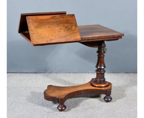 A George IV Rosewood Rectangular Adjustable Reading Table, on baluster turned end support and shaped base with castors, 33ins