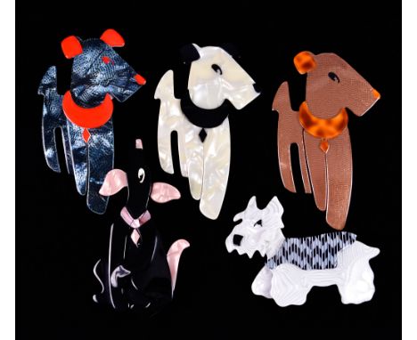 Lea Stein (born 1936) - five laminated cellulose acetate dog brooches, comprising :- three Ric the Terrier brooches in variou