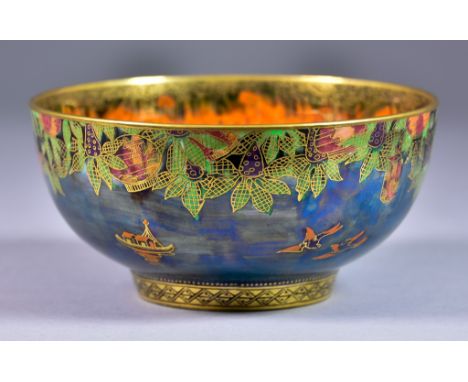A Wedgwood Fairyland Lustre Circular Willow Pattern Bowl, designed by Daisy Makeig-Jones, pattern no. Z5407, the exterior wit