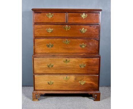 A George III Mahogany Tallboy, the upper part with moulded edge to top, fitted two short and two long graduated drawers, the 