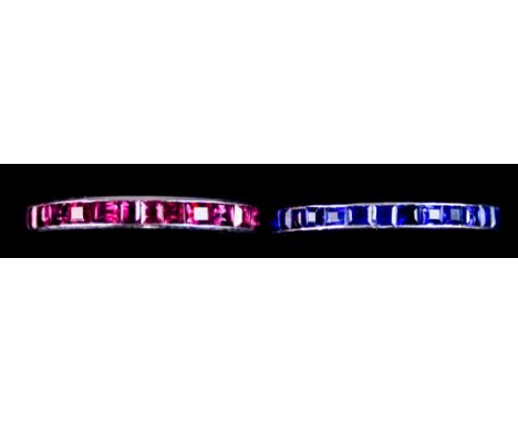 Two Platinum Eternity Rings, one set with baguette cut rubies, the other with small sapphires, both ring size R, total gross 