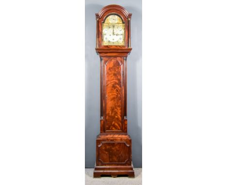 A 19th Century Mahogany Longcase Clock, by Benjamin Taylor of London, the 12ins arched brass dial with silvered centre and ch