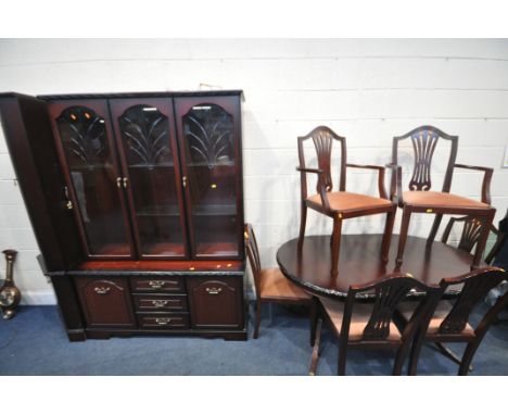 A MORRIS OF GLASGOW MAHOGANY DINING SUITE, comprising an extending dining table, length 153cm x depth 89cm x height 73cm, six