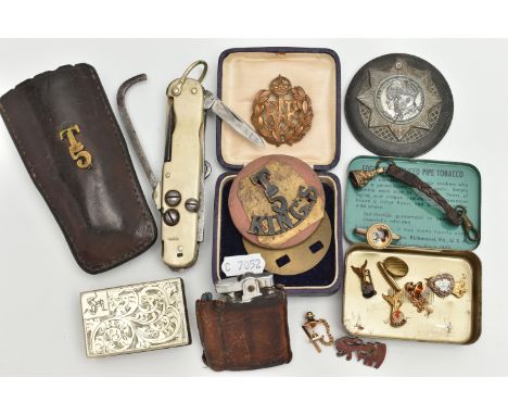 ASSORTED ITEMS, to include a gold plated fob with leather strap, an EPNS match stick box cover, an 'Edgeworth Pipe Tobacco' t