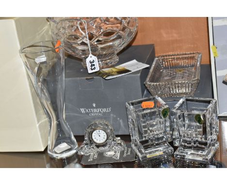 SIX PIECES OF BOXED AND LOOSE WATERFORD CRYSTAL, comprising a pair of 'Metropolitan Votive' square candleholders, height 10cm