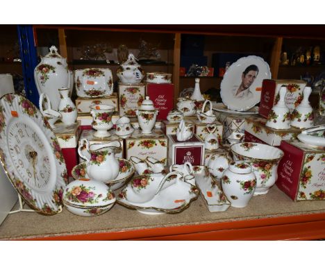 A LARGE QUANTITY OF BOXED ROYAL ALBERT 'OLD COUNTRY ROSES' PATTERN GIFTWARE, comprising a wall clock, pomander, planter, ging